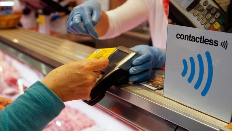 contactless payment card being used
